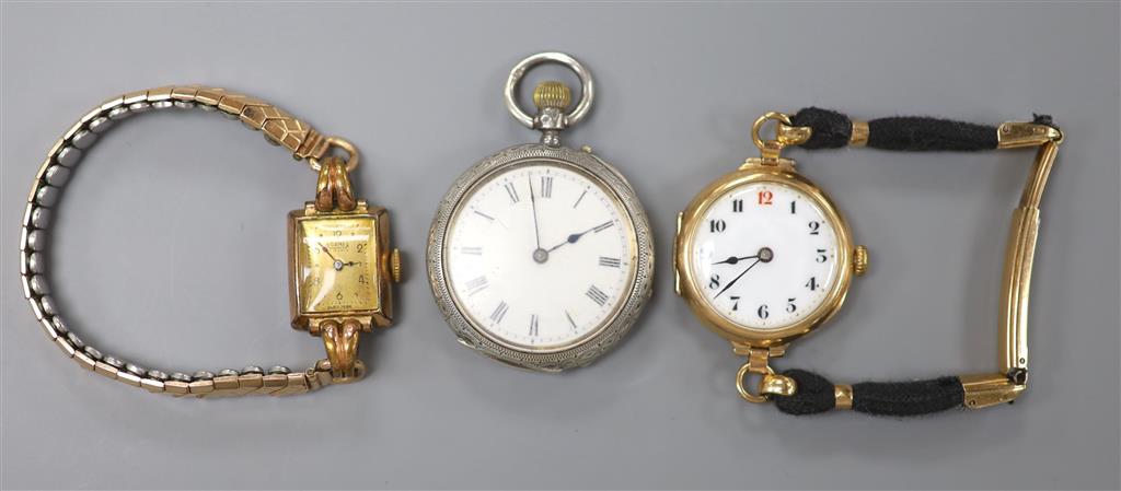 An early 20th century 9ct gold manual wind wrist watch, gross 23.9 grams, one other watch and a silver fob watch.